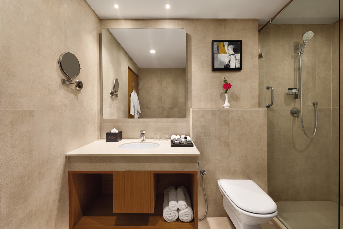 Image of Ramada Hotel Bathroom with deluxe room